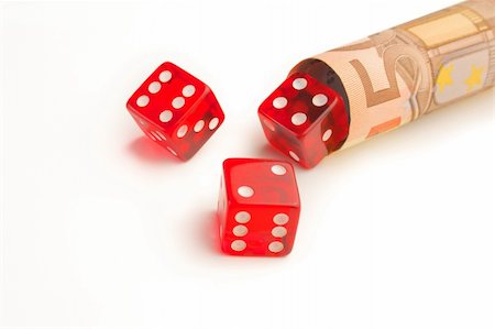 simsearch:400-04672615,k - Close up Money rolled up with three dice Stock Photo - Budget Royalty-Free & Subscription, Code: 400-05704881