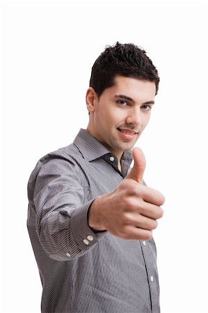 simsearch:400-06769983,k - Handsome young man with thumbs up on an isolated white background Foto de stock - Royalty-Free Super Valor e Assinatura, Número: 400-05705007