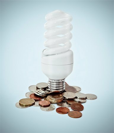 sustainable money - Eco lighbulb concept and money savings on energy Stock Photo - Budget Royalty-Free & Subscription, Code: 400-05705208