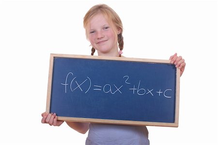 simsearch:400-06080922,k - Smart young math student showing a quadratic equation Stock Photo - Budget Royalty-Free & Subscription, Code: 400-05705332