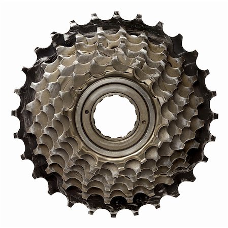 simsearch:700-02671349,k - Bicycle gear, metal cogwheel. Isolated on white. Stock Photo - Budget Royalty-Free & Subscription, Code: 400-05705739