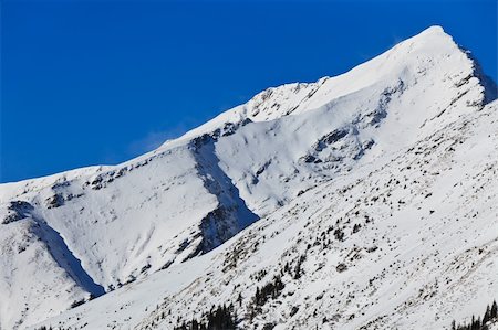 simsearch:400-07298343,k - winter mountain landscape with a blue sky, Fagaras Mountains, Romania Fotografie stock - Microstock e Abbonamento, Codice: 400-05706020