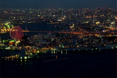 people japan big city - Harbor area of Osaka City in Japan at night with lots of lights Foto de stock - Super Valor sin royalties y Suscripción, Código: 400-05706130