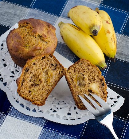 simsearch:400-04380218,k - Delicious fresh baked banana muffins, with raisins and walnuts, dairy free suitable for vegan Stock Photo - Budget Royalty-Free & Subscription, Code: 400-05706253