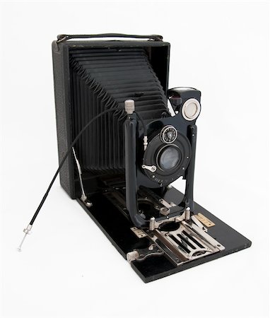 simsearch:400-04527928,k - Authentic old black photo camera Foto de stock - Super Valor sin royalties y Suscripción, Código: 400-05706365