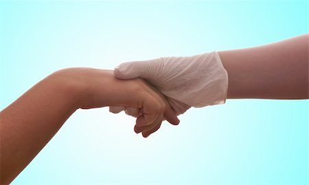 A hand with a medical latex glove holds another hand Foto de stock - Super Valor sin royalties y Suscripción, Código: 400-05706430