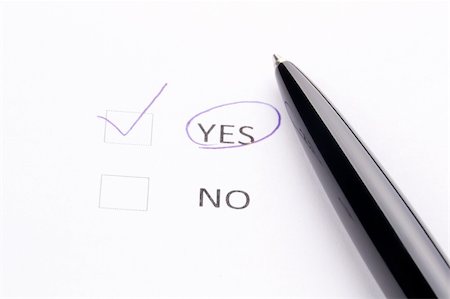 Pen on checklist: "YES" and "NO" Stock Photo - Budget Royalty-Free & Subscription, Code: 400-05706555