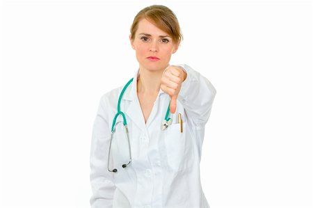 simsearch:400-04351236,k - Serious medical doctor woman showing thumbs down isolated on white Photographie de stock - Aubaine LD & Abonnement, Code: 400-05706946