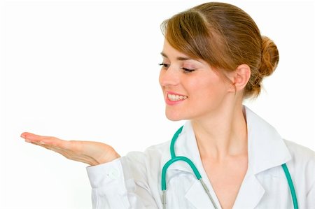 simsearch:400-07099823,k - Smiling medical female doctor looking on empty palm isolated on white Stock Photo - Budget Royalty-Free & Subscription, Code: 400-05706956