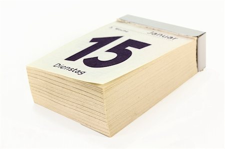 silencefoto (artist) - a pad calendar on a white background Stockbilder - Microstock & Abonnement, Bildnummer: 400-05708282