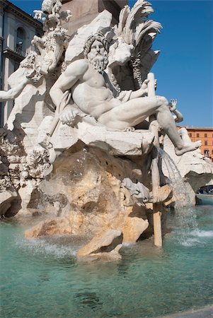 piazza navona - Nettuno's fountain in Piazza Navona at Roma. etail of the statue Fotografie stock - Microstock e Abbonamento, Codice: 400-05709385