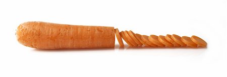 simsearch:673-02140337,k - Closeup of partially sliced fresh organic carrot on white background Stock Photo - Budget Royalty-Free & Subscription, Code: 400-05709440