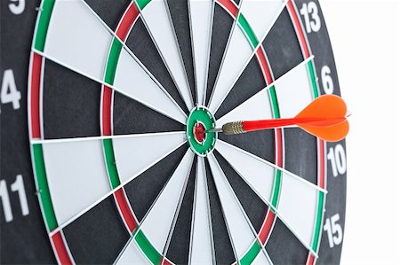 Shallow depth of field shot of darts in bullseye on dartboard Stock Photo - Budget Royalty-Free & Subscription, Code: 400-05700926