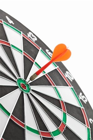 dart board competition - Shallow depth of field shot of darts in bullseye on dartboard Stock Photo - Budget Royalty-Free & Subscription, Code: 400-05700927