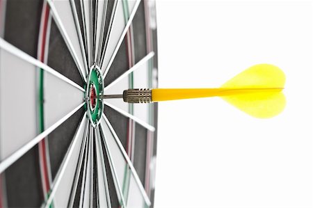 Shallow depth of field shot of darts in bullseye on dartboard Stock Photo - Budget Royalty-Free & Subscription, Code: 400-05700928