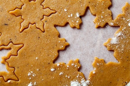 simsearch:400-06430094,k - Making gingerbread cookies for Christmas. Gingerbread dough with star shapes. Stock Photo - Budget Royalty-Free & Subscription, Code: 400-05701344