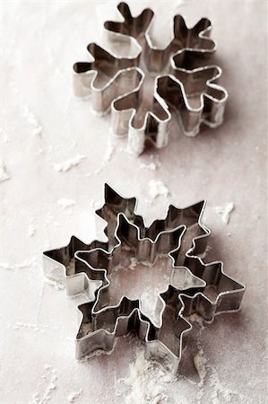 Close-up of metallic gingerbread cutters, star shape and snowflake Stock Photo - Budget Royalty-Free & Subscription, Code: 400-05701349