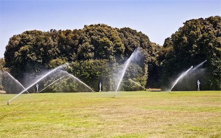 Reggia di Caserta (Caserta Royal Palace), Italy. Luxury royal garden: irrigation operations Stock Photo - Budget Royalty-Free & Subscription, Code: 400-05701900