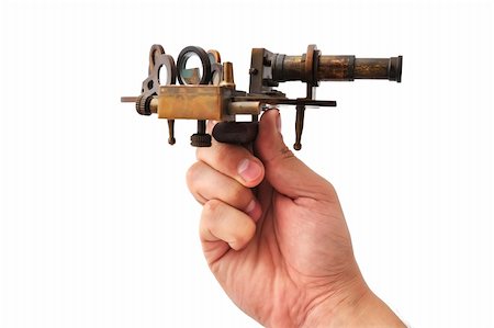 simsearch:400-04908052,k - old sextant in hand  on a white background Foto de stock - Super Valor sin royalties y Suscripción, Código: 400-05701927