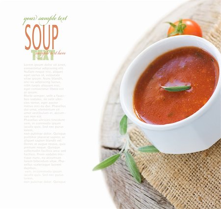 simsearch:400-05320343,k - Fresh tomato soup with cherry tomatoes and fresh herbs and copyspace Stock Photo - Budget Royalty-Free & Subscription, Code: 400-05702020