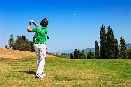 Golf Player hits his ball on the fairway Photographie de stock - Aubaine LD & Abonnement, Code: 400-05702841