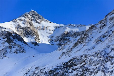 simsearch:400-07298343,k - winter mountain landscape with a blue sky, Fagaras Mountains, Romania Fotografie stock - Microstock e Abbonamento, Codice: 400-05702996