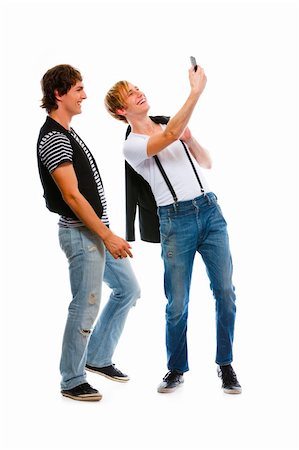 simsearch:400-05753456,k - Two modern teenage boys making photos on cell phone. Isolated on white Foto de stock - Super Valor sin royalties y Suscripción, Código: 400-05703092