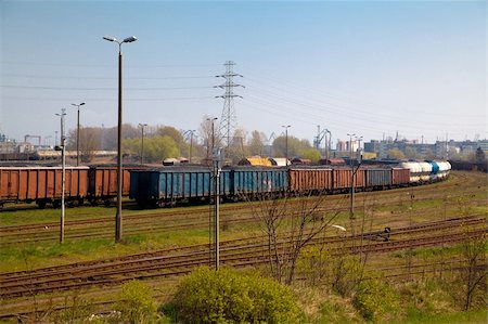 Overview of the railway freight station with lot of different wagons Stock Photo - Budget Royalty-Free & Subscription, Code: 400-05703146