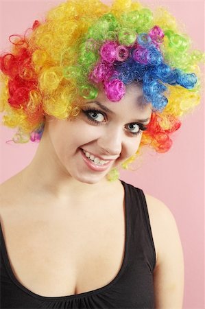 funny wig woman - Beautiful smiling girl in the wig of the clown Stock Photo - Budget Royalty-Free & Subscription, Code: 400-05703234