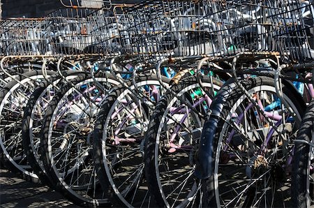 Old bicycles parked in a row Stock Photo - Budget Royalty-Free & Subscription, Code: 400-05714295