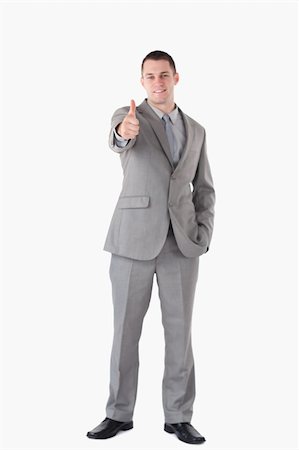 executive welcome - Portrait of a businessman with the thumb up against a white background Stock Photo - Budget Royalty-Free & Subscription, Code: 400-05714867