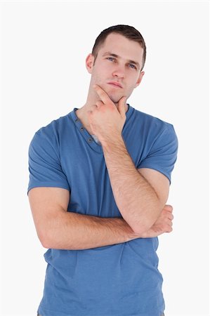 Portrait of a pensive young man against a white background Stock Photo - Budget Royalty-Free & Subscription, Code: 400-05715242