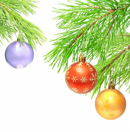 simsearch:400-06477568,k - Christmas ornaments on a branch of a pine. Isolated over white Stockbilder - Microstock & Abonnement, Bildnummer: 400-05715829