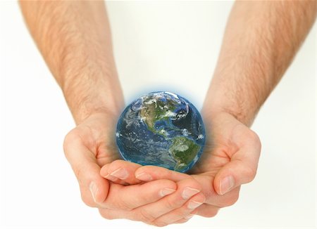 simsearch:400-04030475,k - Masculine hands holding a planet globe against a white background Foto de stock - Royalty-Free Super Valor e Assinatura, Número: 400-05716348