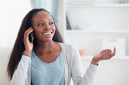 simsearch:400-05716936,k - Close up of smiling woman on the phone Stock Photo - Budget Royalty-Free & Subscription, Code: 400-05716404