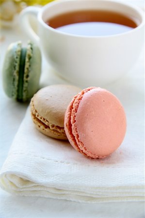 traditional french macarons with tea set on the background Stock Photo - Budget Royalty-Free & Subscription, Code: 400-05716576