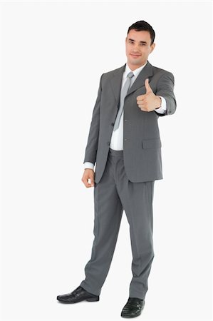 simsearch:400-05718341,k - Young businessman giving thumb up against a white background Stock Photo - Budget Royalty-Free & Subscription, Code: 400-05718091