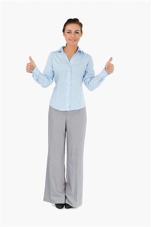 simsearch:400-05898224,k - Businesswoman giving thumbs up against a white background Foto de stock - Royalty-Free Super Valor e Assinatura, Número: 400-05718138