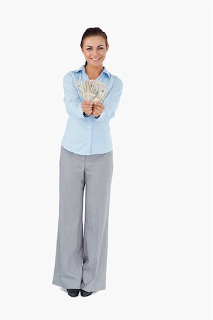 simsearch:400-05718322,k - Businesswoman presenting banknotes against a white background Fotografie stock - Microstock e Abbonamento, Codice: 400-05718157