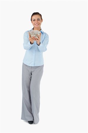 simsearch:400-05718322,k - Smiling businesswoman presenting banknotes against a white background Fotografie stock - Microstock e Abbonamento, Codice: 400-05718158