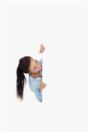 eye background for banner - Businesswoman looking around the corner against a white background Stock Photo - Budget Royalty-Free & Subscription, Code: 400-05718228