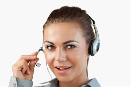 simsearch:400-04001946,k - Close up of talking female call center agent against a white background Foto de stock - Super Valor sin royalties y Suscripción, Código: 400-05718520