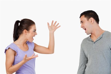 Young couple having a fight against a white background Stock Photo - Budget Royalty-Free & Subscription, Code: 400-05718751