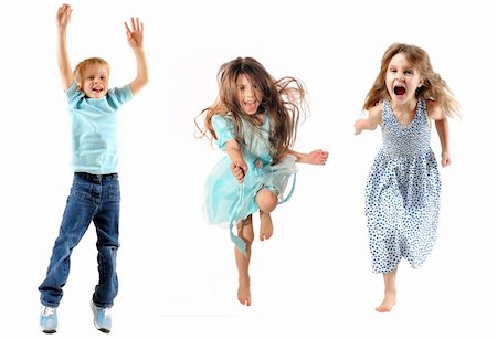 Happy children jumping and dancing. Isolated over white. Stock Photo - Budget Royalty-Free & Subscription, Code: 400-05719109