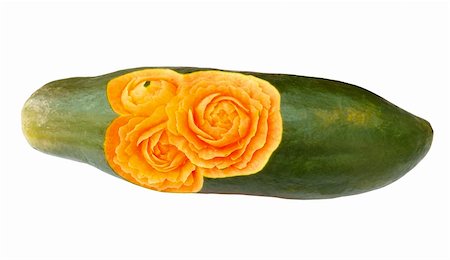 Carved papaya isolated on white background Stock Photo - Budget Royalty-Free & Subscription, Code: 400-05719293