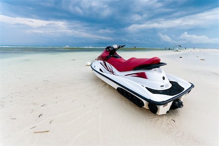 jet ski at low tide on a Bohol beach, Philippines Foto de stock - Super Valor sin royalties y Suscripción, Código: 400-05719683