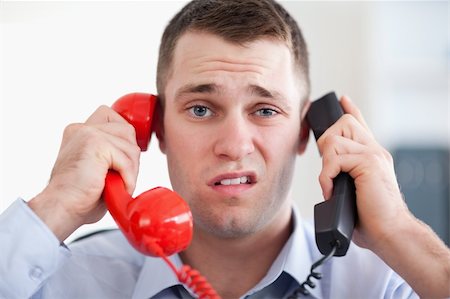 sad man talking phone - Close up businessman overextended with the phone Stock Photo - Budget Royalty-Free & Subscription, Code: 400-05710312