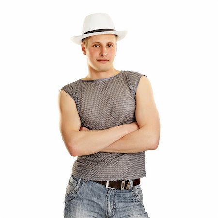 simsearch:400-07316542,k - A young man in a T-shirt, jeans and a hat isolated on white background Stock Photo - Budget Royalty-Free & Subscription, Code: 400-05710901