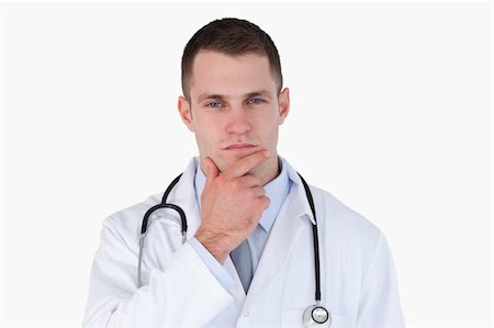 simsearch:400-05710928,k - Close up of thinking doctor on white background Stockbilder - Microstock & Abonnement, Bildnummer: 400-05710963