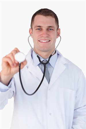 simsearch:400-05710928,k - Close up of doctor using stethoscope on white background Stockbilder - Microstock & Abonnement, Bildnummer: 400-05710971